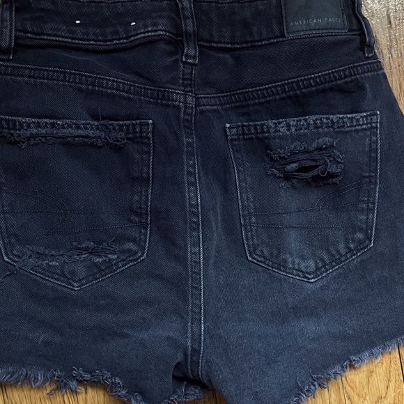 Ripped Black Jean shorts with distraction details. American Eagle size 00 - Picture 9 of 11